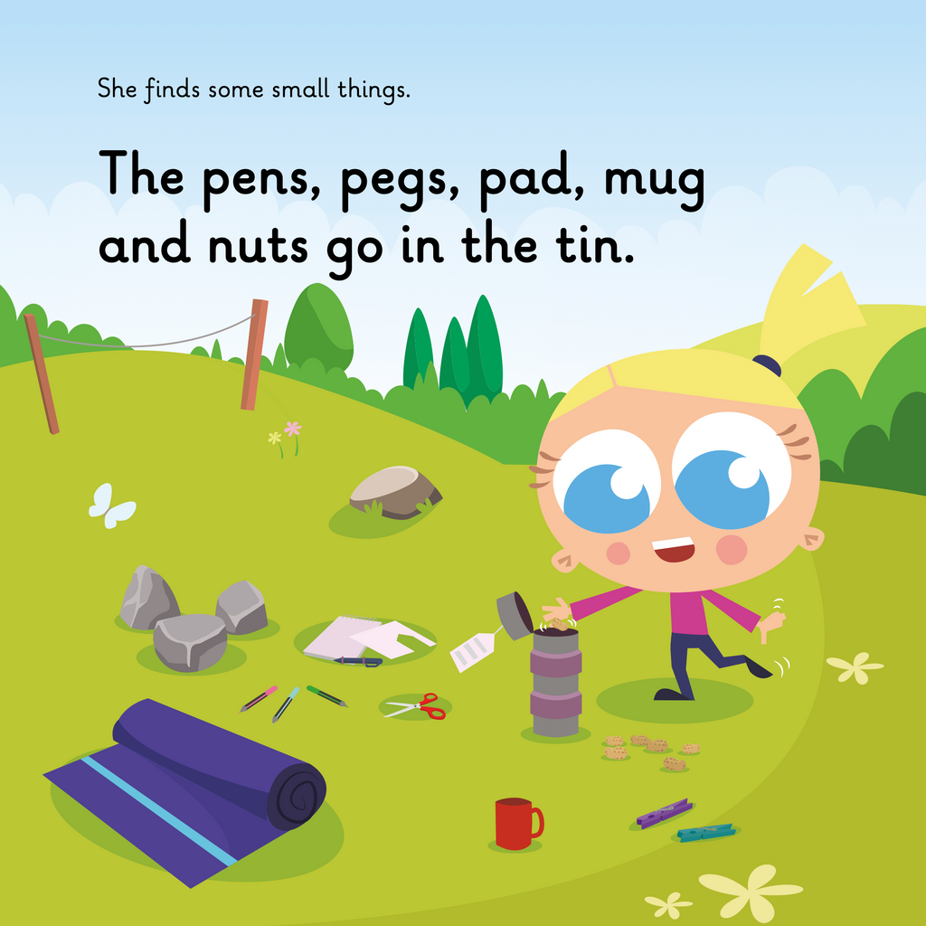 Learn phonics with Actiphons Upside-down Ulla reading book page 3 Upside-down Ulla filling her time capsule with pens, pegs, pads and a mug