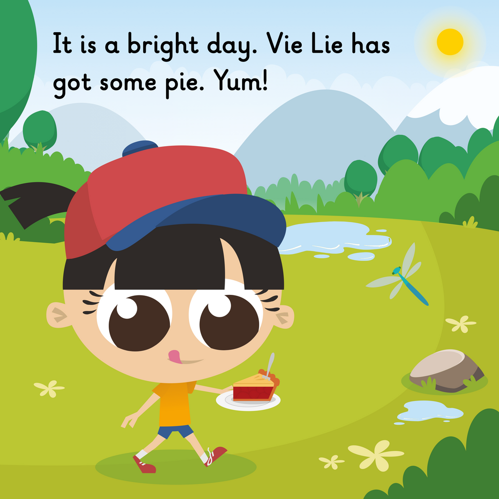 Learn phonics with Actiphons Vie Lie reading book page 1 Vie Lie is wearing his favourite red cap carrying a piece of pie through the meadow on a hot sunny day